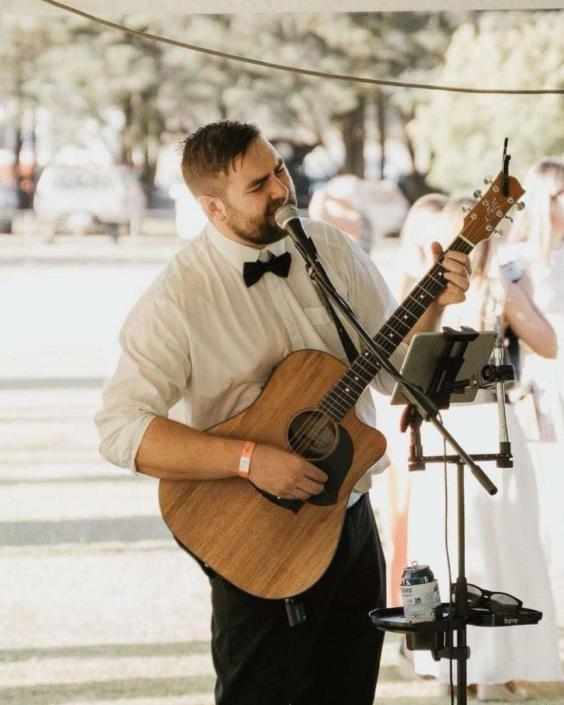Liam Baker performing live with acoustic guitar at The Courthouse Hotel Smythesdale