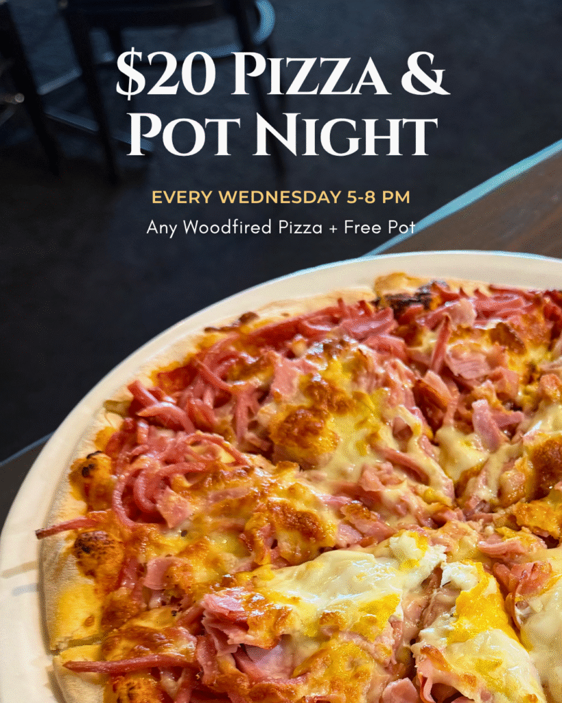 Woodfired pizza and a pot on a table for $20 Wednesday special at The Courthouse Hotel Smythesdale.